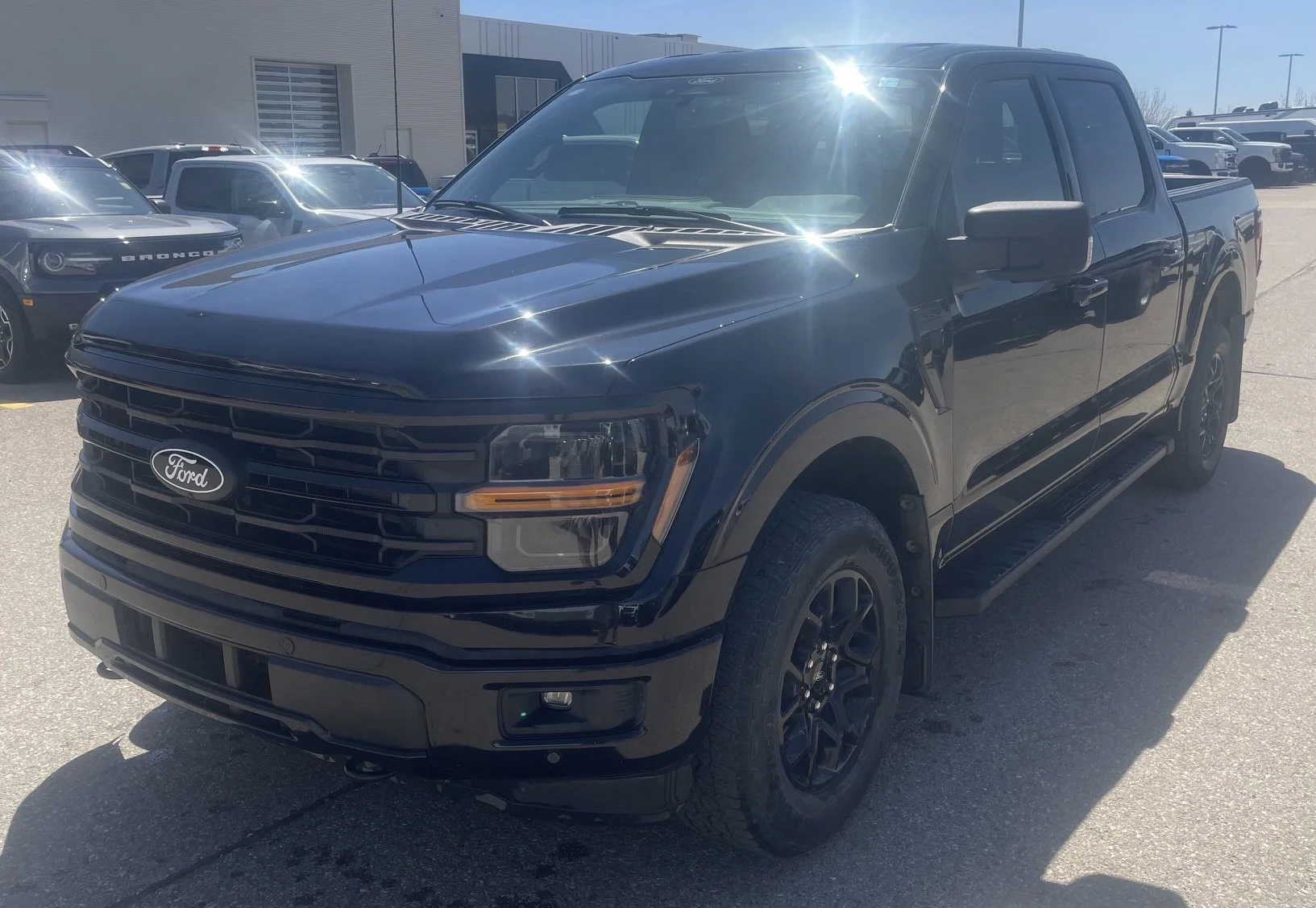 Used 2024 BLACK Ford XLT SuperCrew   EcoBoost™  **New Arrival** image 1