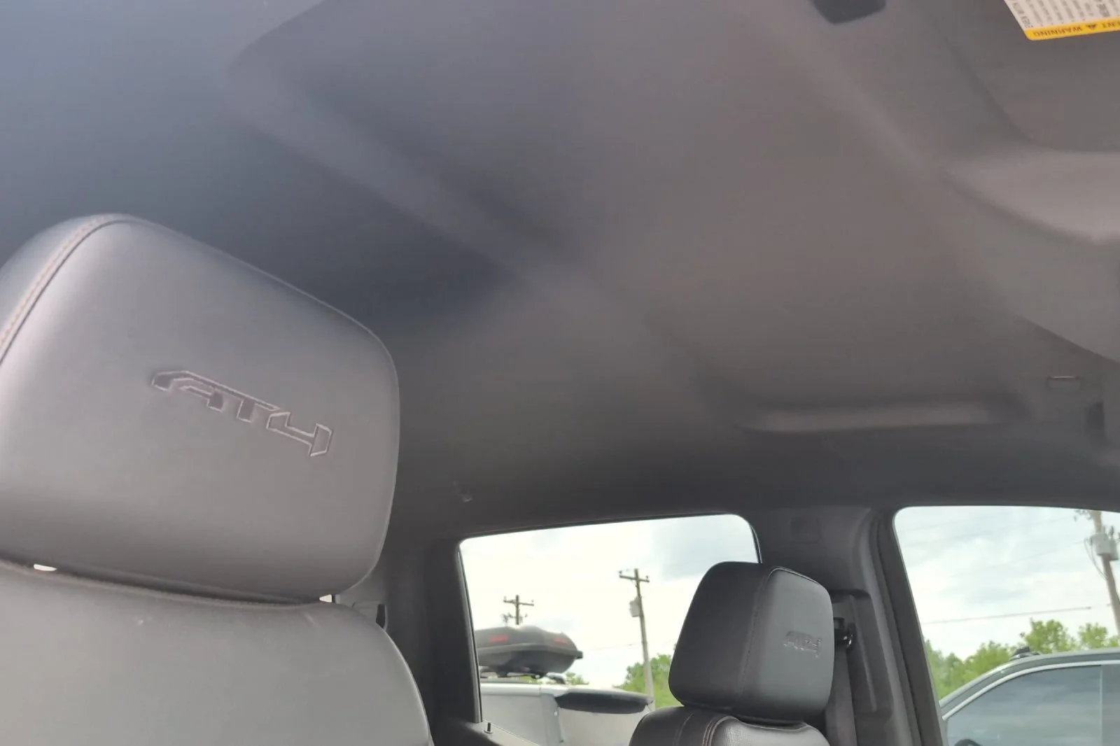 Used 2024 Thunderstorm Gray GMC AT4 image 17