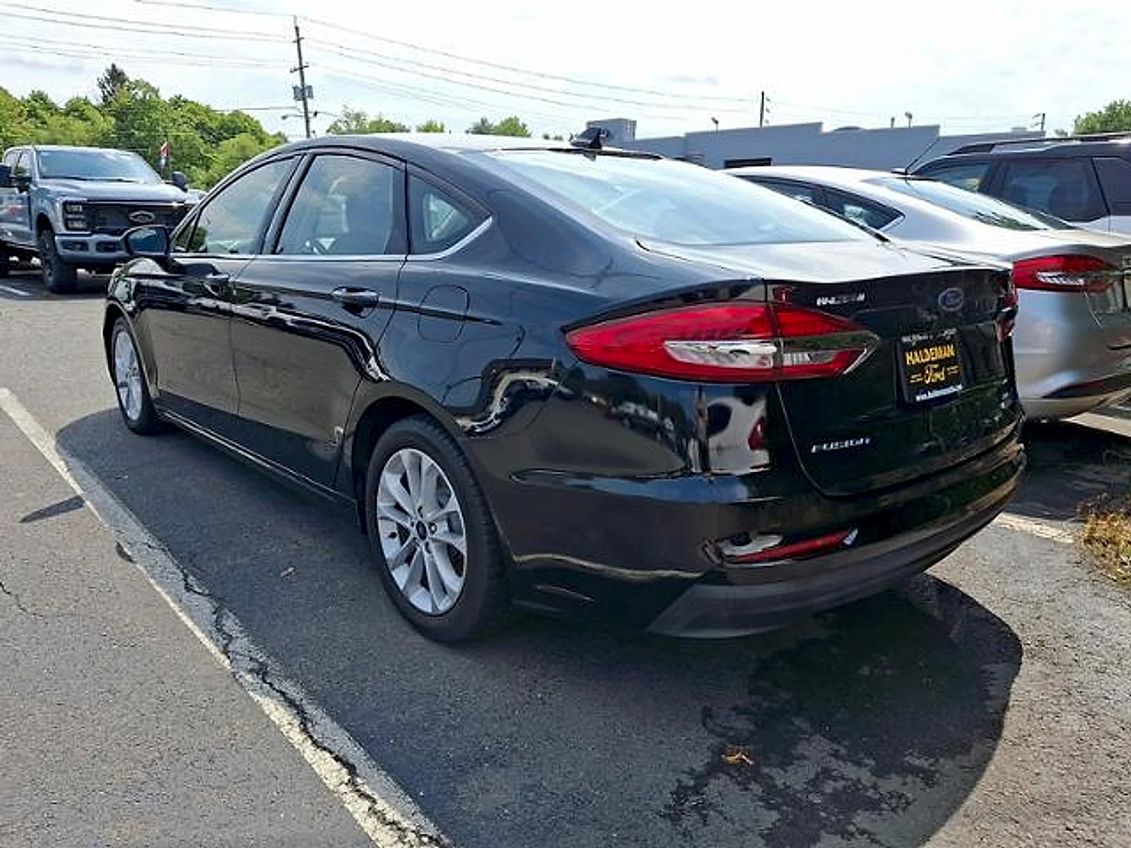 Used 2020 Agate Black Metallic Ford Hybrid SE image 6