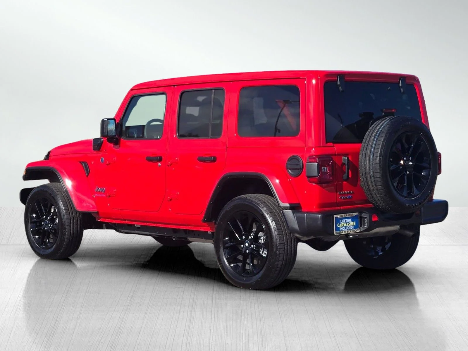 Used 2025 Firecracker Red Clearcoat Jeep Sahara 4xe image 9