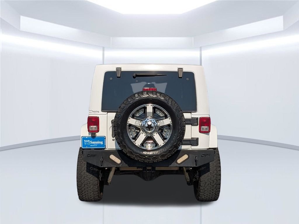 Used 2014 White Jeep Unlimited Sahara image 5