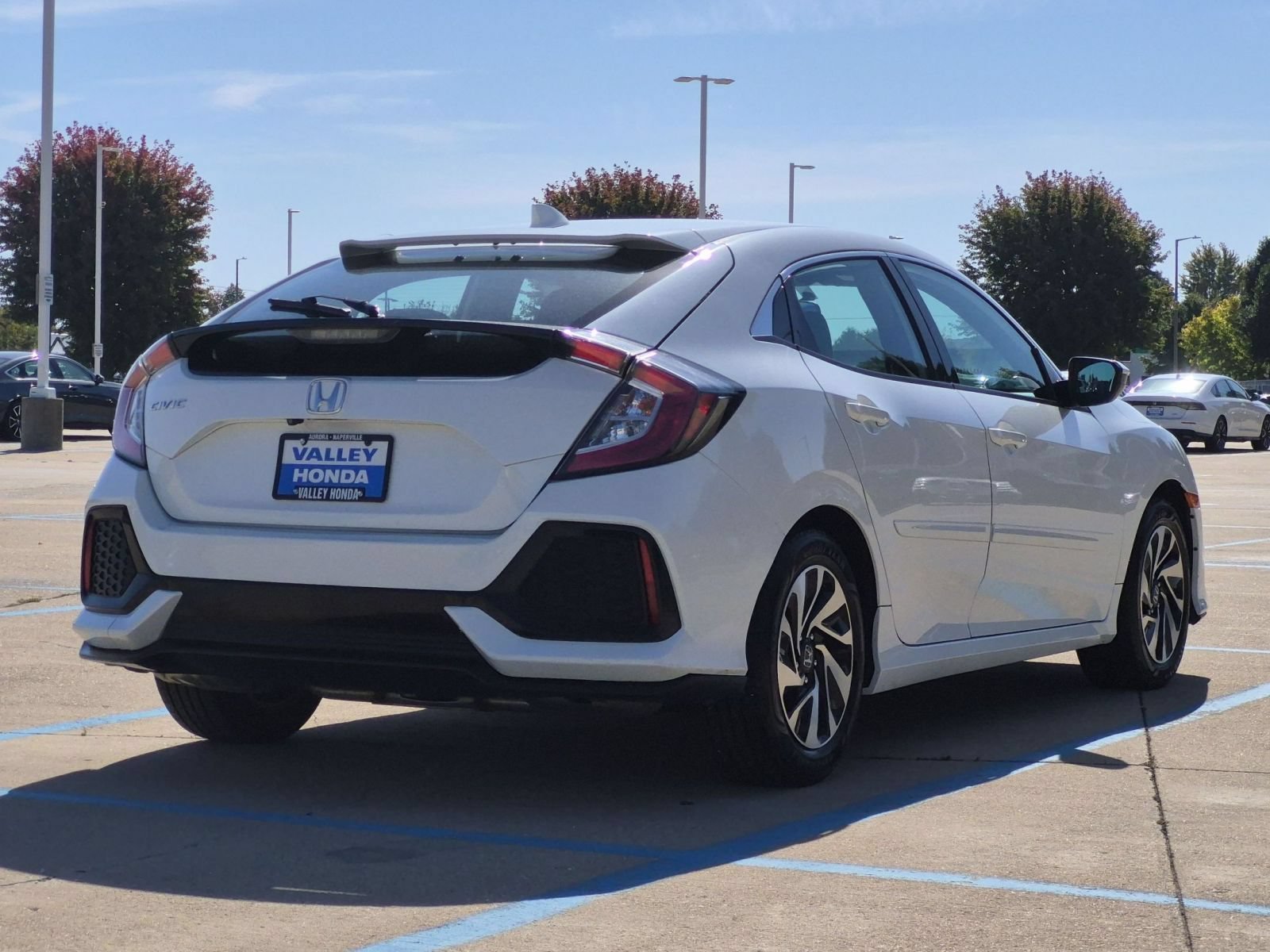 Used 2017 White Orchid Pearl Honda LX Hatchback image 6