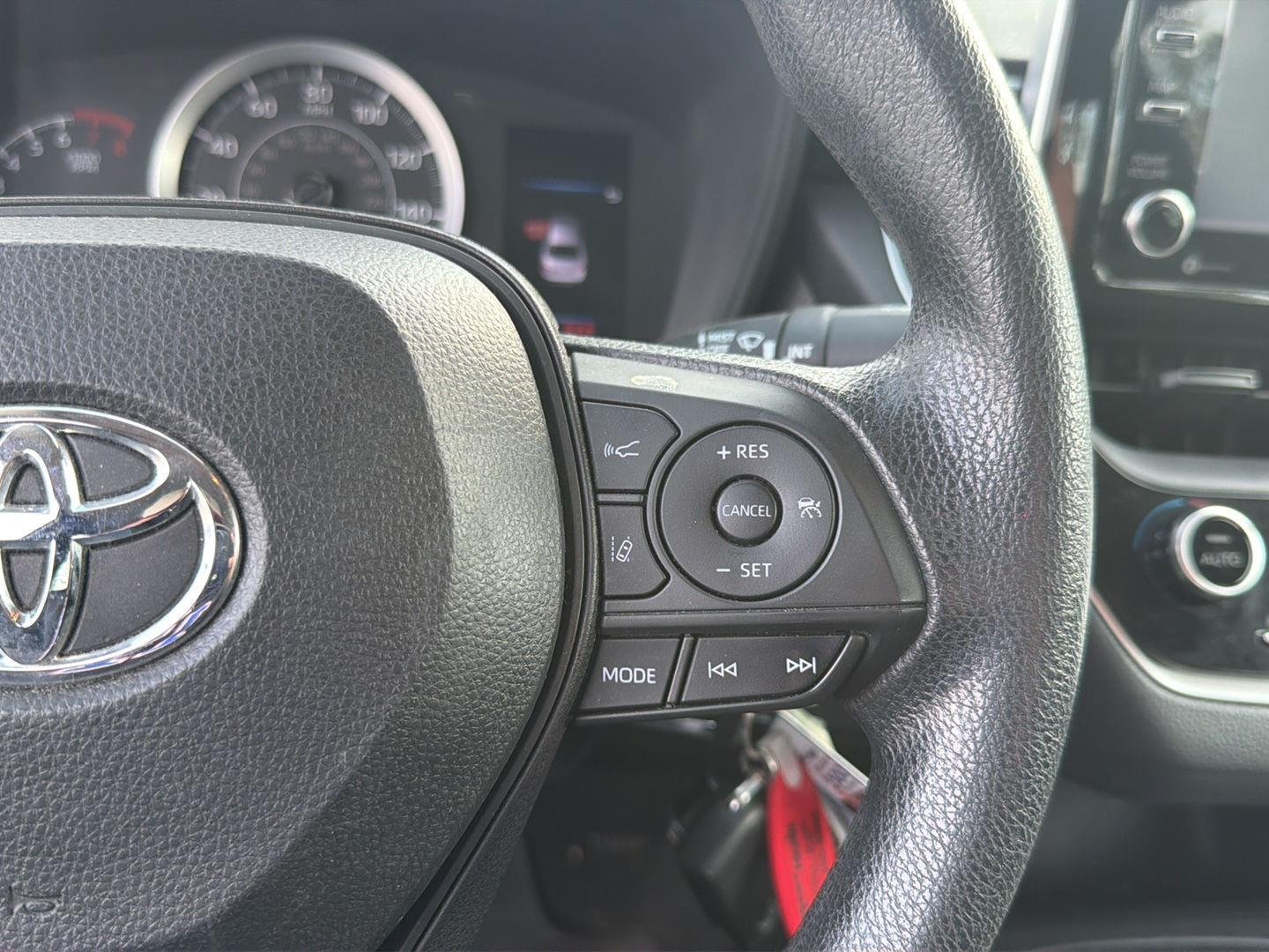 Used 2021 Classic Silver Metallic Toyota LE image 12