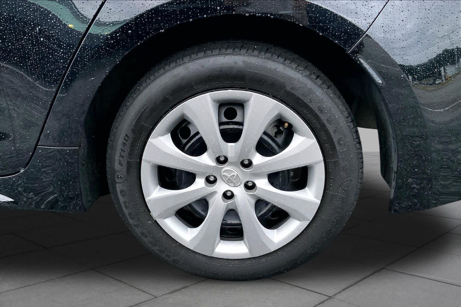 Used 2024 Midnight Black Metallic Toyota LE image 11