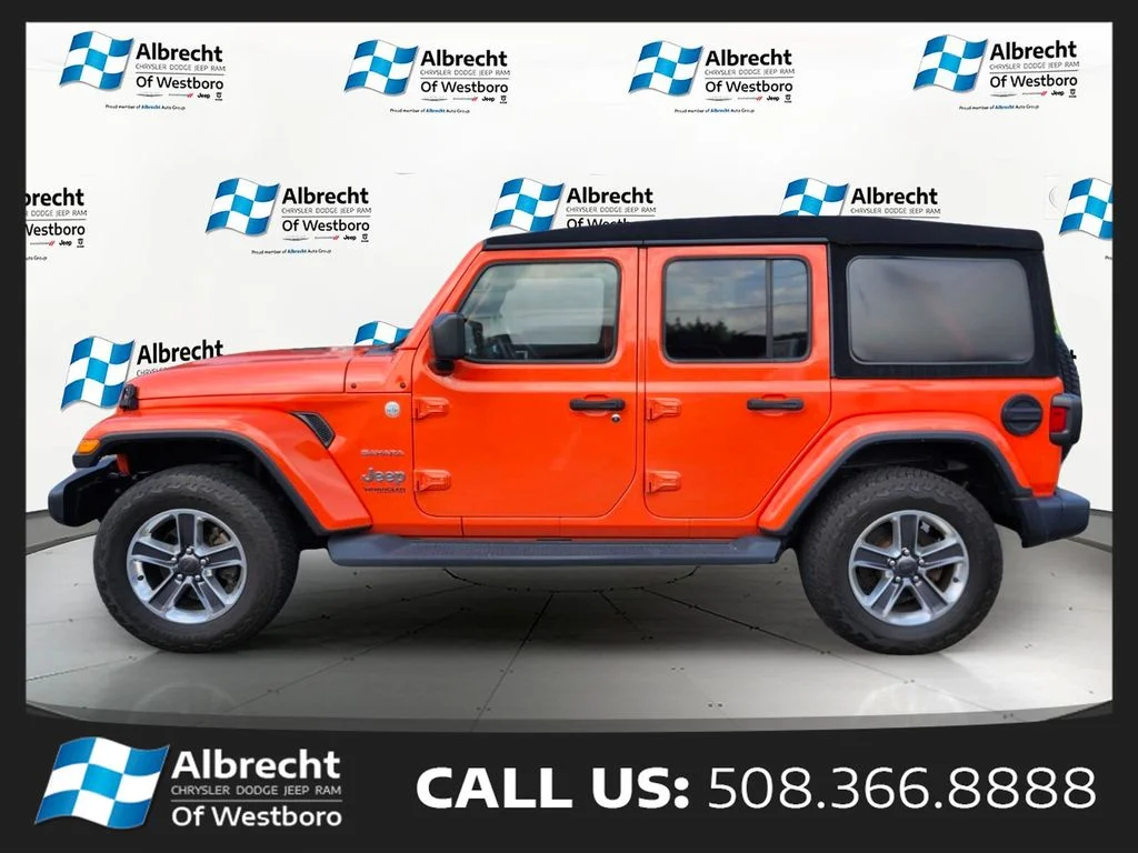 Used 2020 Orange Jeep Unlimited Sahara image 2