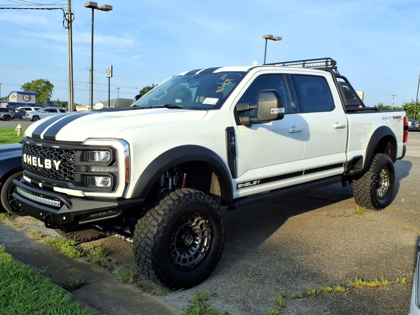 Used 2024 Star White Metallic Tri-Coat Ford LARIAT image 1