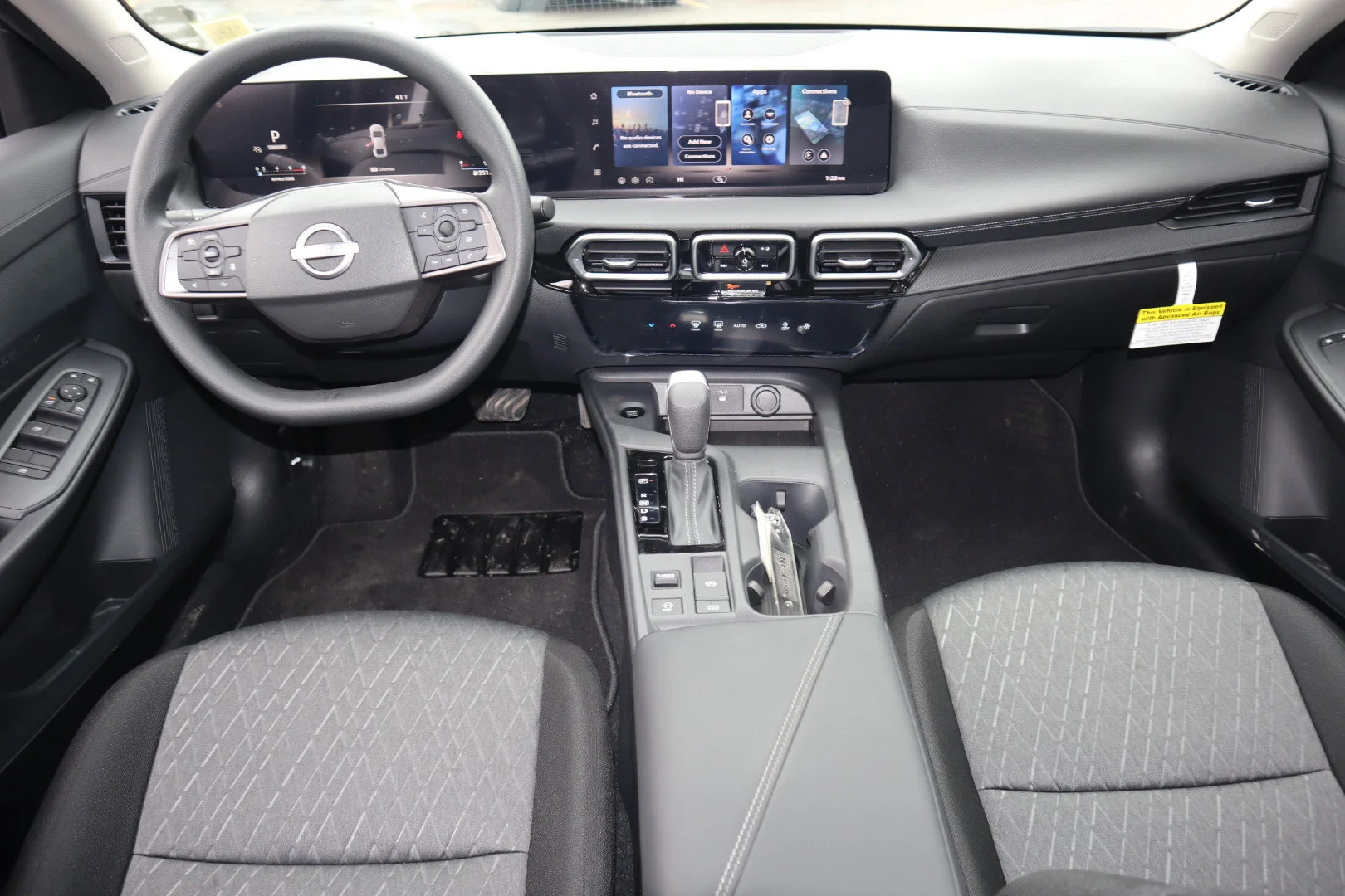 New 2026 Gun Metallic Nissan SV image 13