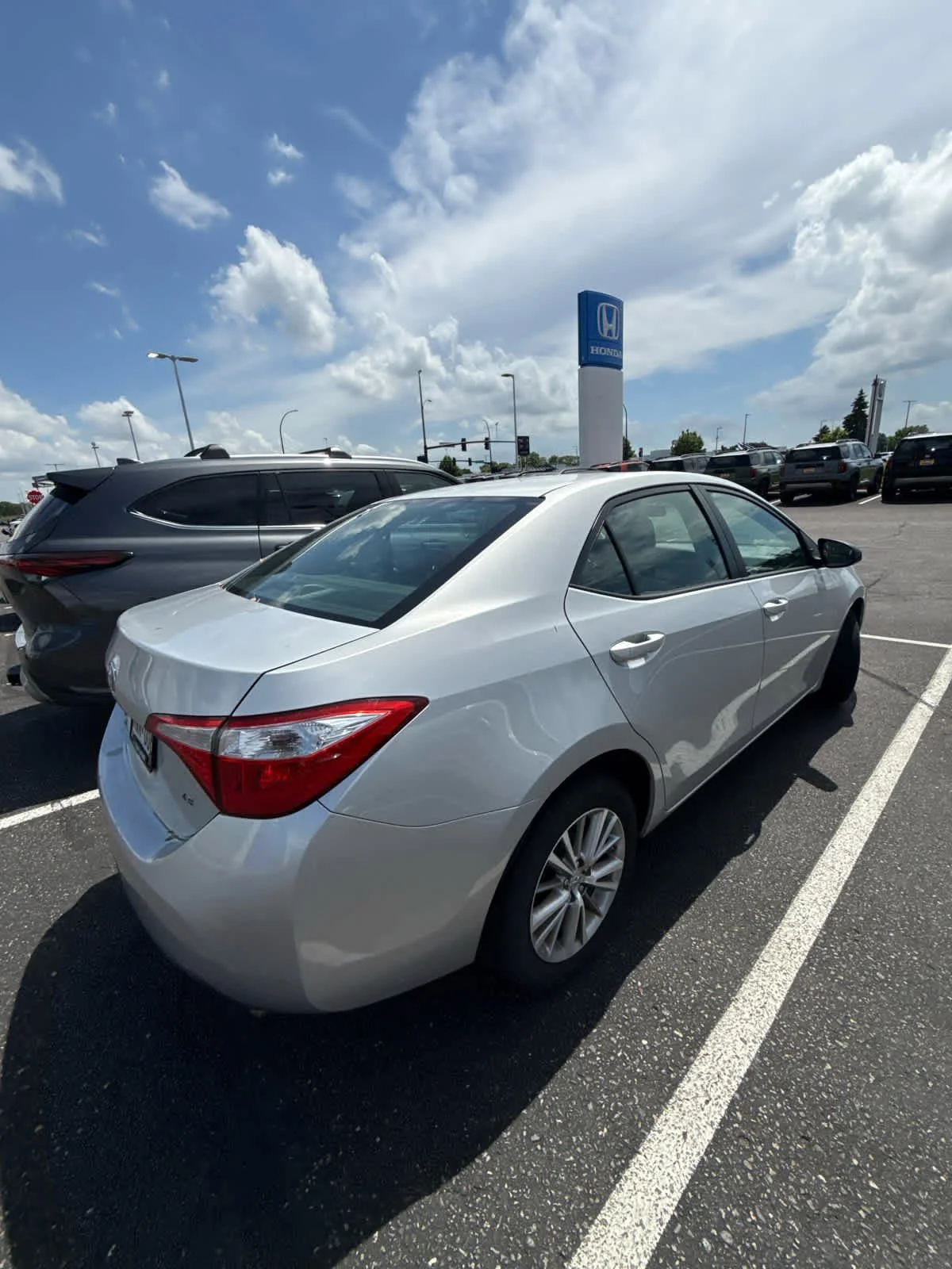 Used 2015 Classic Silver Metallic Toyota LE Plus image 2