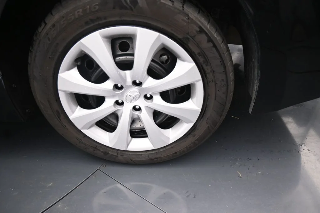 Used 2024 Black Toyota LE image 16