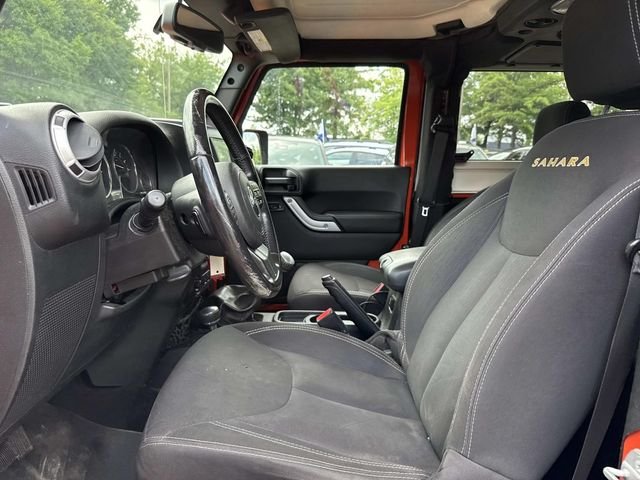 Used 2015 Orange Jeep Sahara image 13