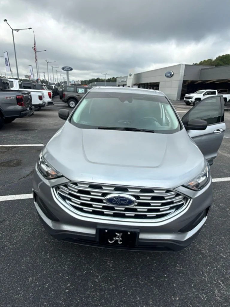 Used 2021 Silver Metallic Ford SE image 1