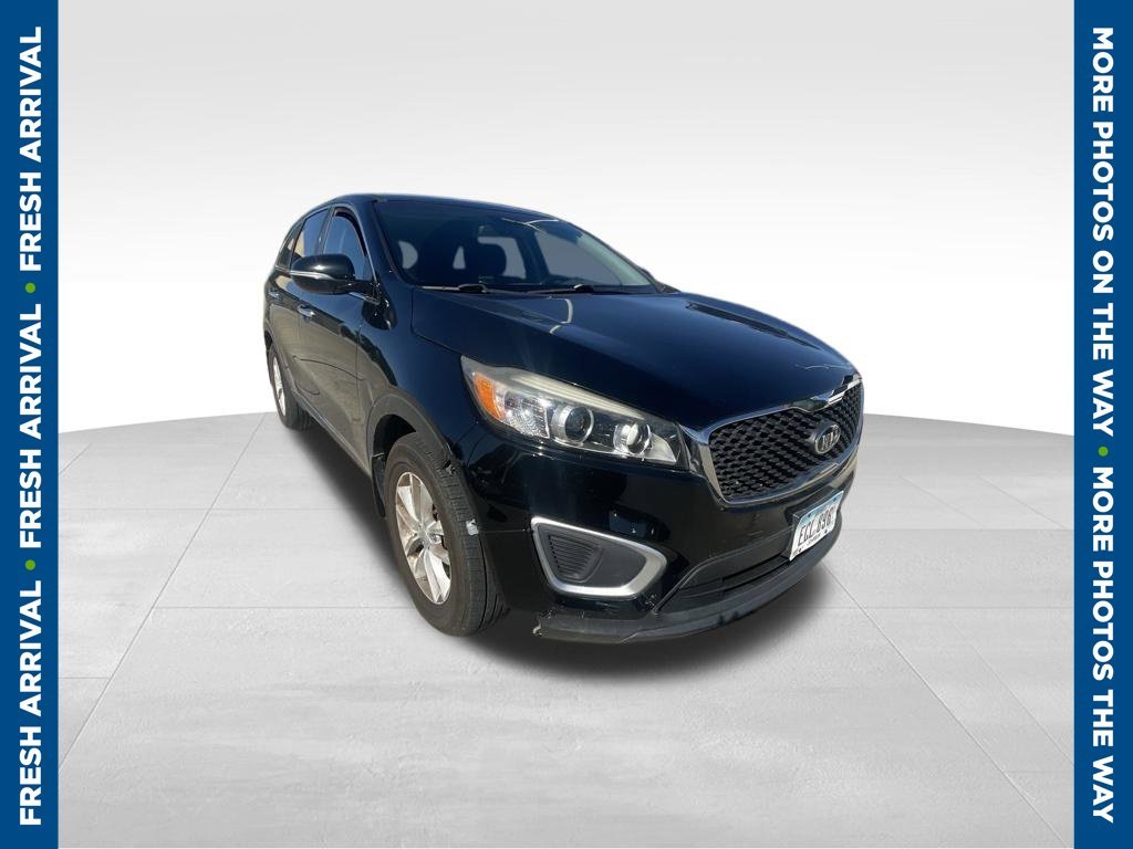 Used 2016 Black Kia L image 1