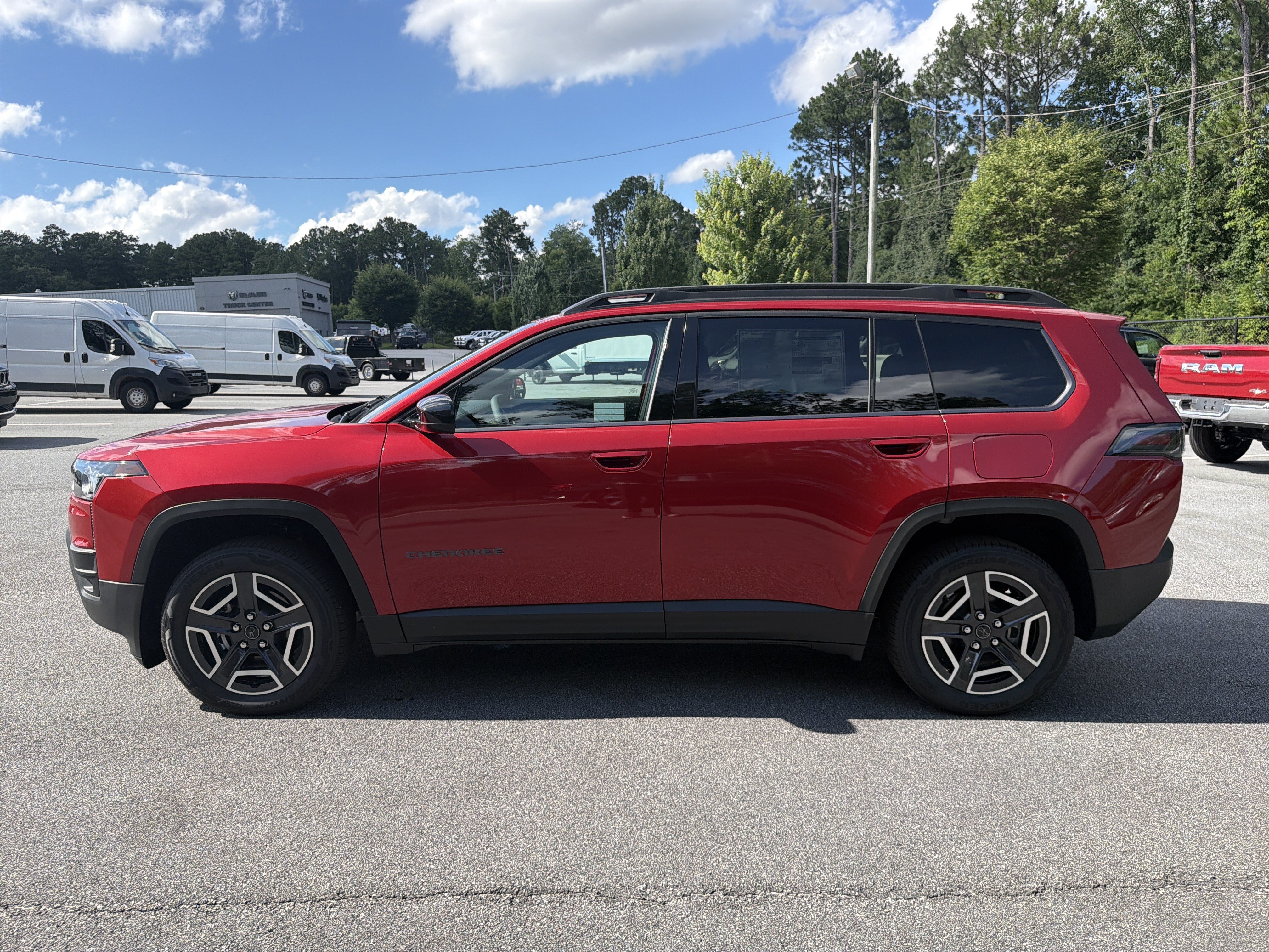 New 2026 Red Hot Pearlcoat Jeep Laredo image 4