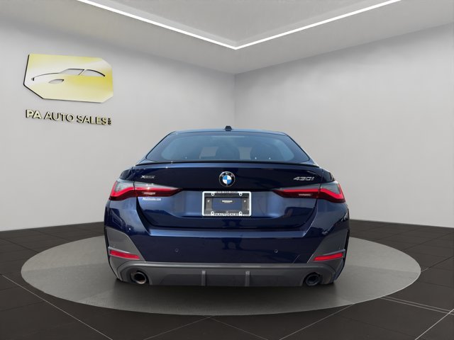 Used 2024 Tanzanite Blue II Metallic BMW 430i xDrive image 6