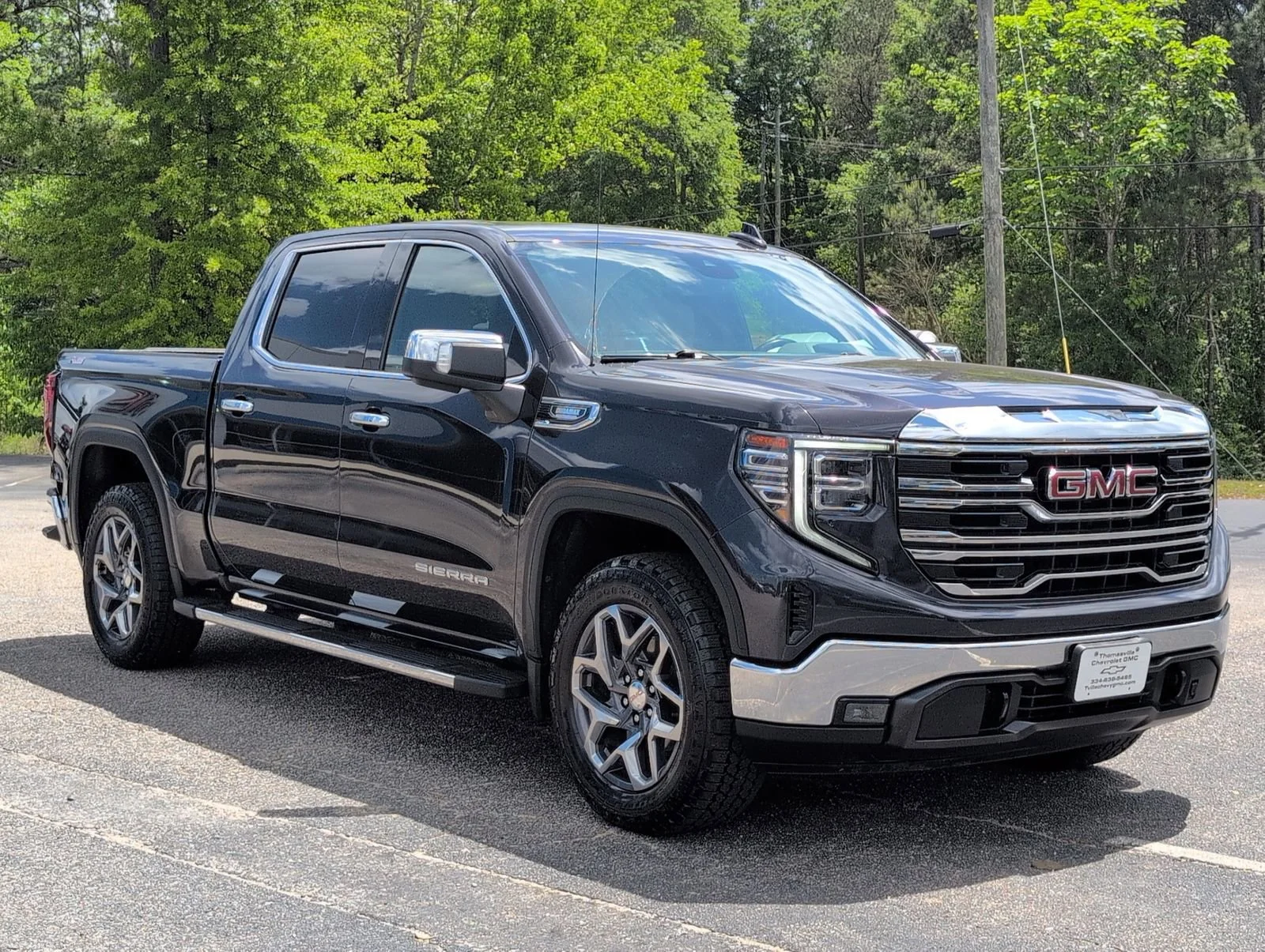 Used 2023 Titanium Rush Metallic GMC SLT image 8