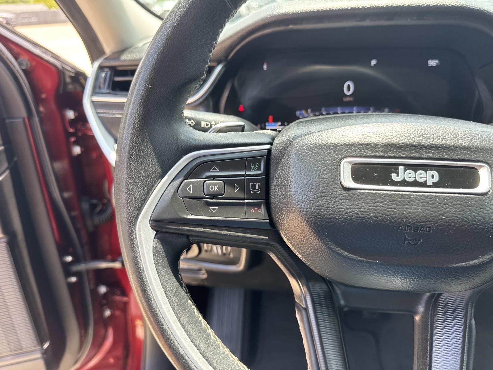 Used 2024 Velvet Red Pearlcoat Jeep Laredo image 22