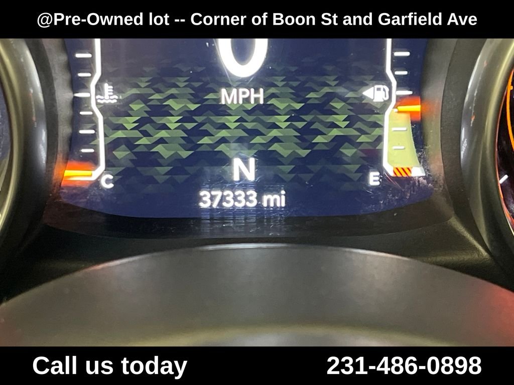 Used 2018 Orange Jeep Unlimited Sahara image 23