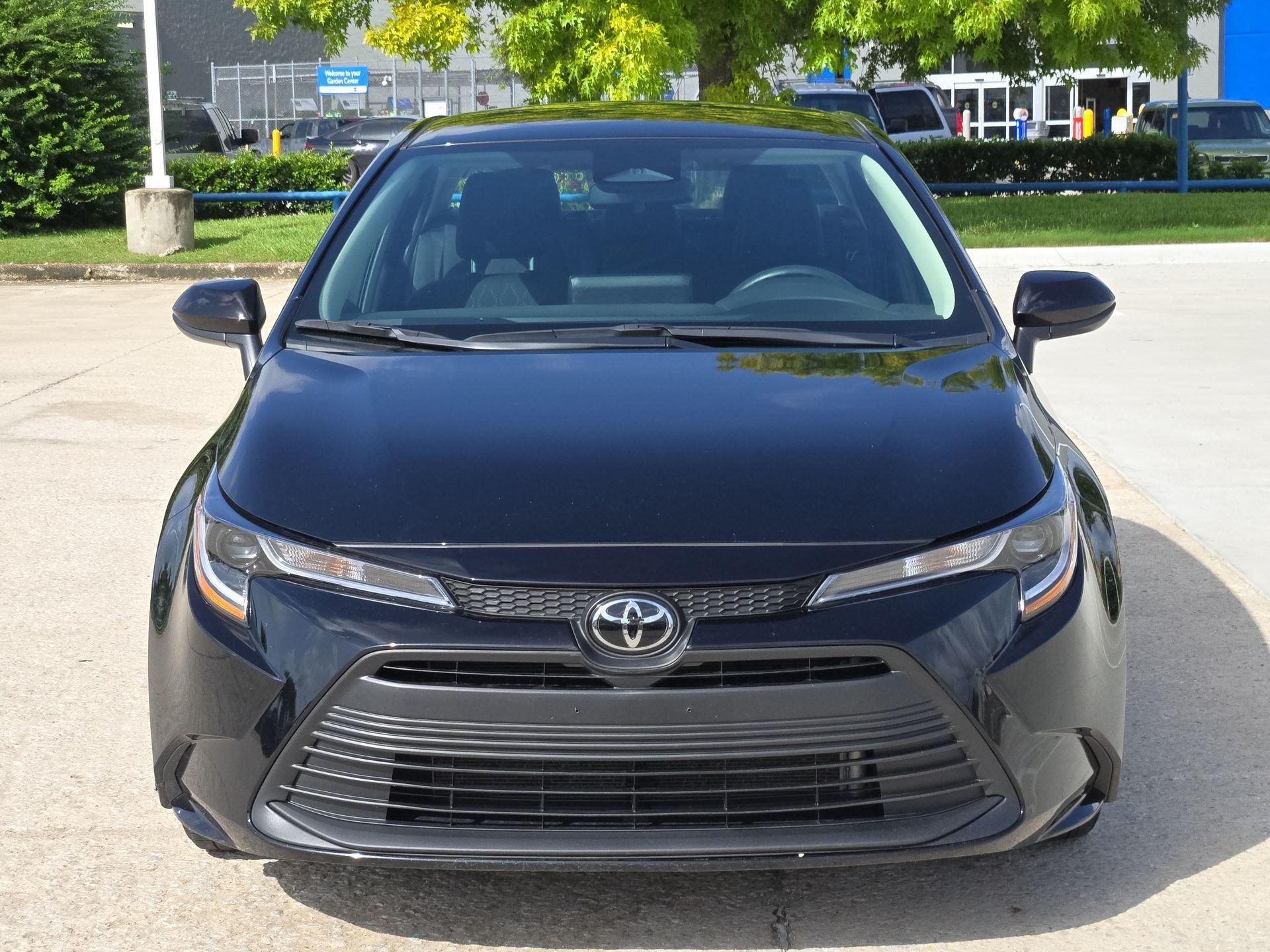 Used 2025 Midnight Black Metallic Toyota LE image 9