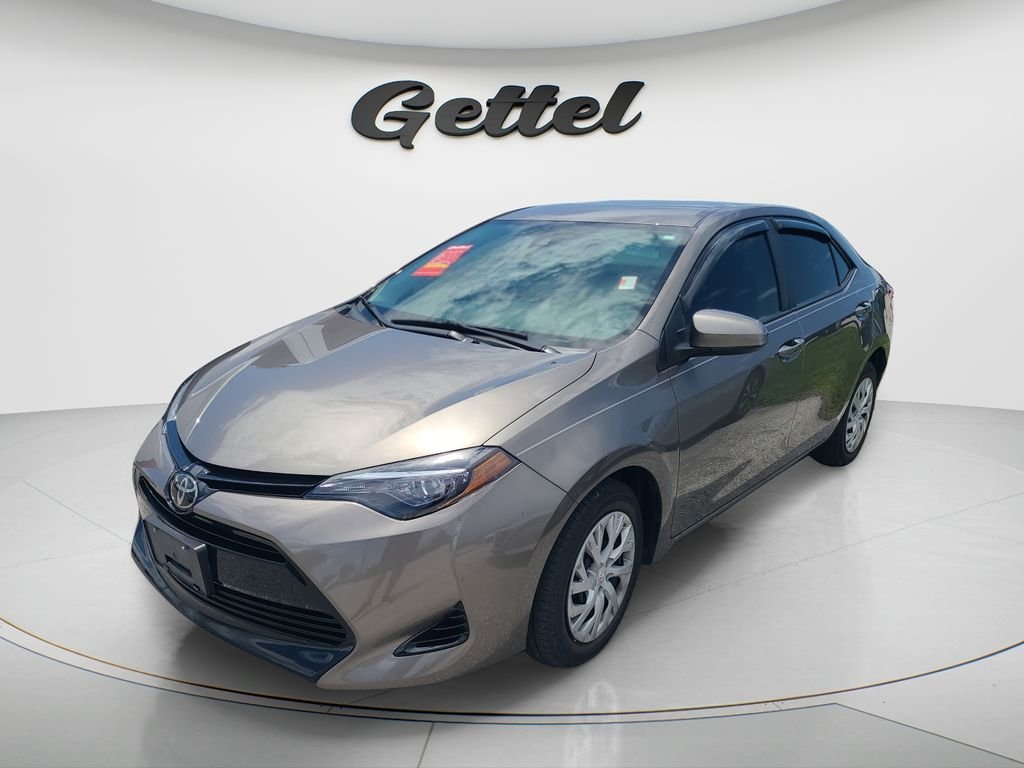Used 2018 Gray Toyota LE image 1