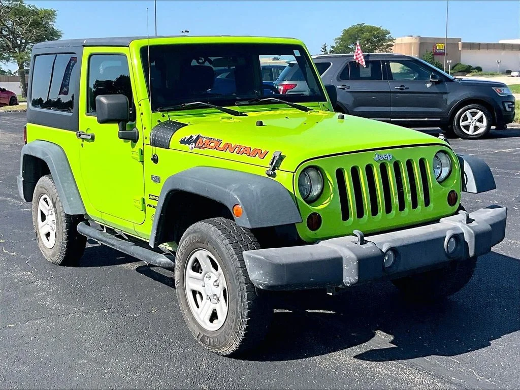 Used 2012 Beige Jeep Sport image 2