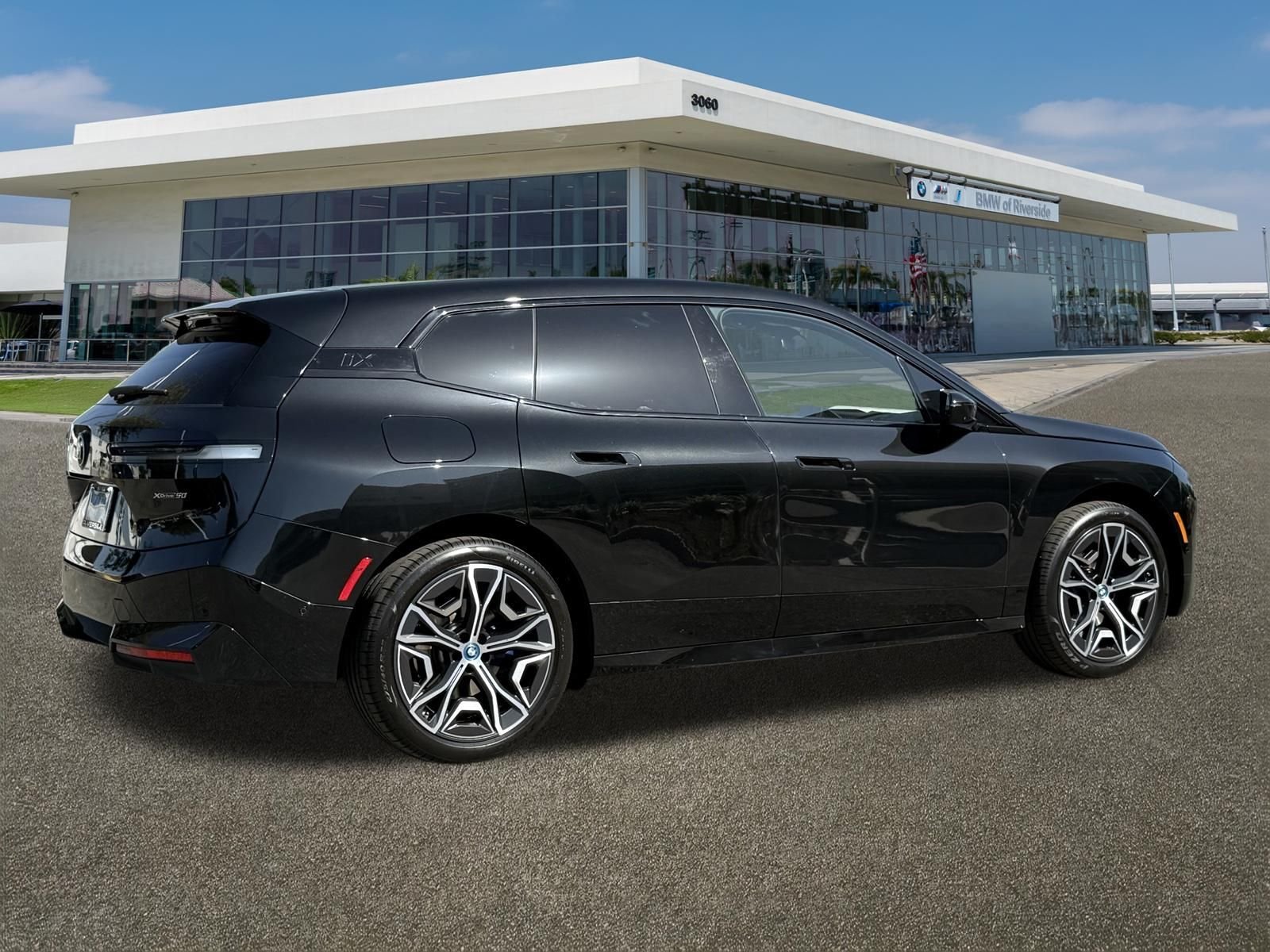 Certified Used 2024 Black BMW xDrive50 image 11