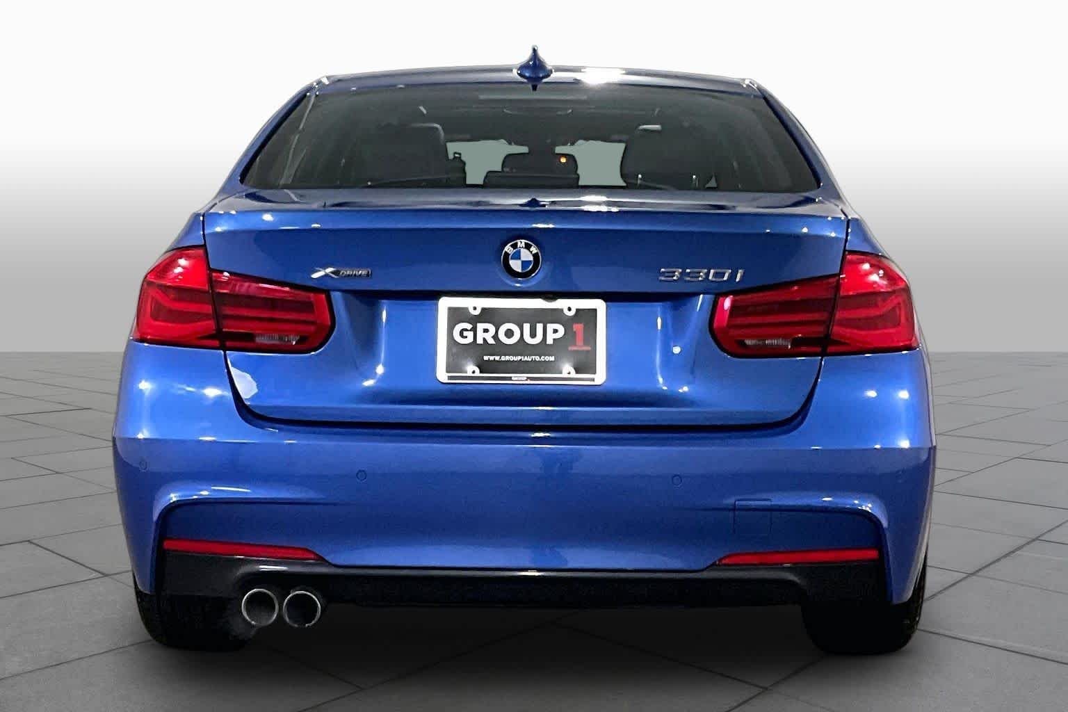 Used 2018 Estoril Blue Metallic BMW 330i xDrive image 4