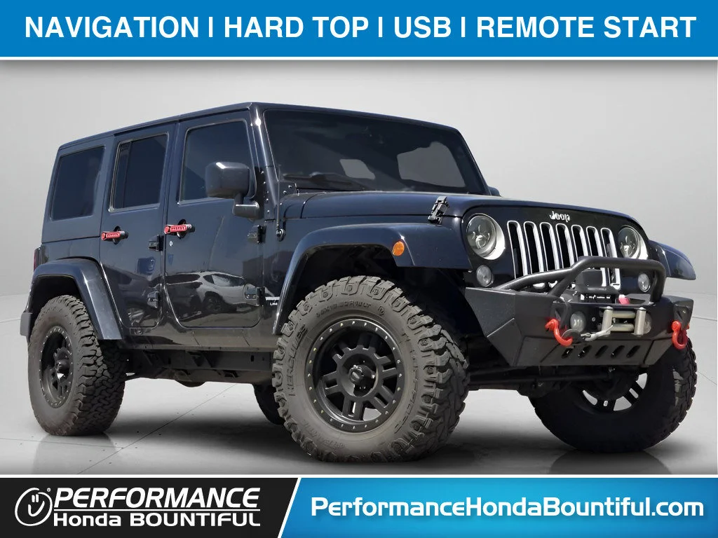 Used 2018 Black Clearcoat Jeep Sahara image 1