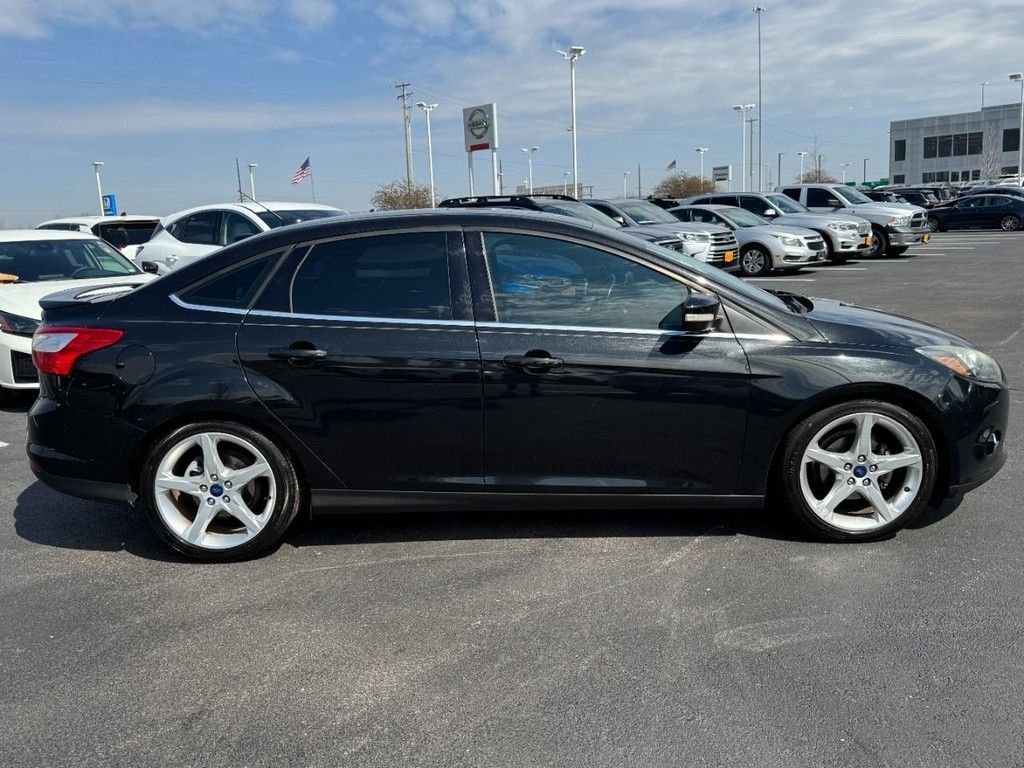Used 2014 Ford Focus Titanium with VIN 1FADP3J27EL196996 for sale in St. Peters, MO