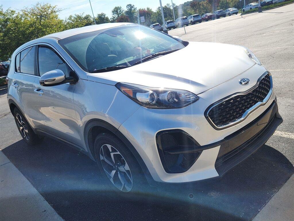 Used 2021 Snow White Pearl Kia LX image 1