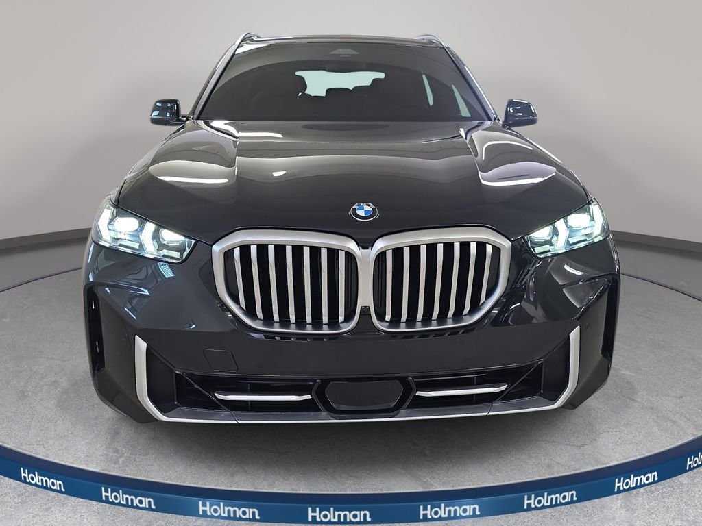 Certified Used 2024 Black Sapphire Metallic BMW xDrive40i image 2