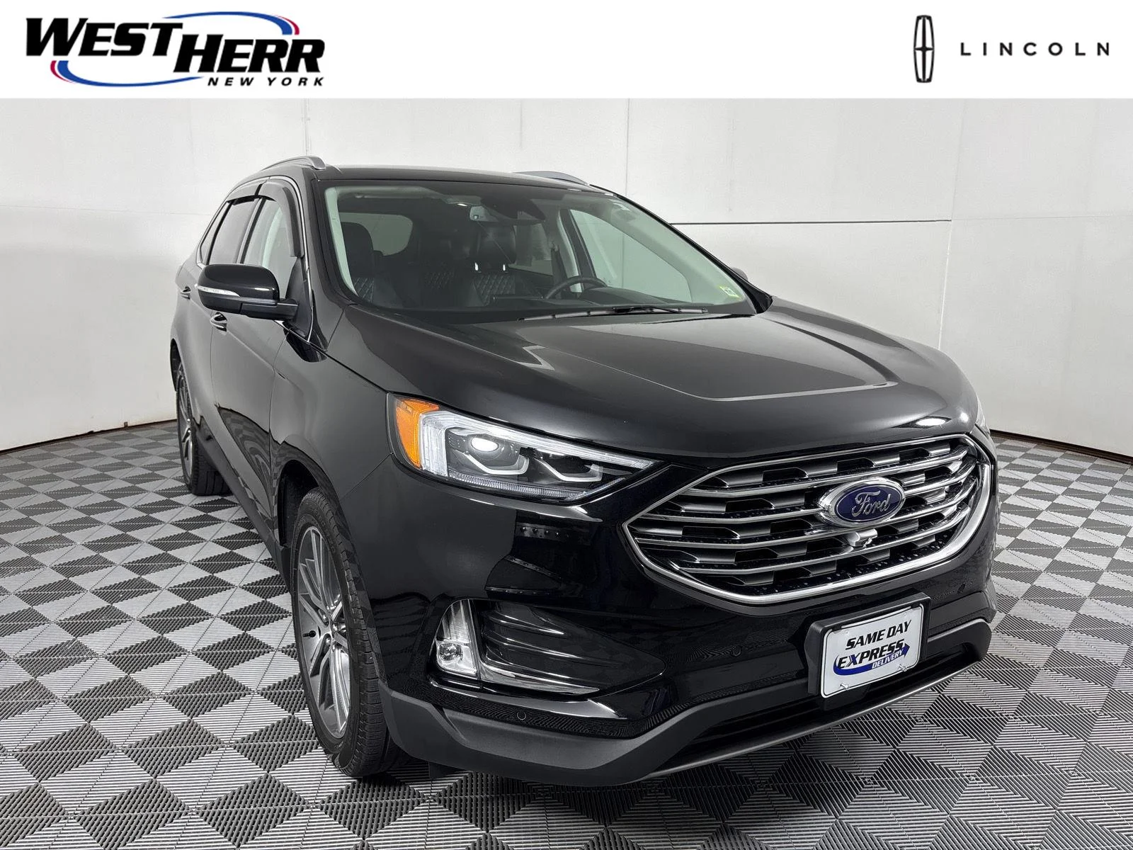 Used 2024 Agate Black Metallic Ford Titanium image 1