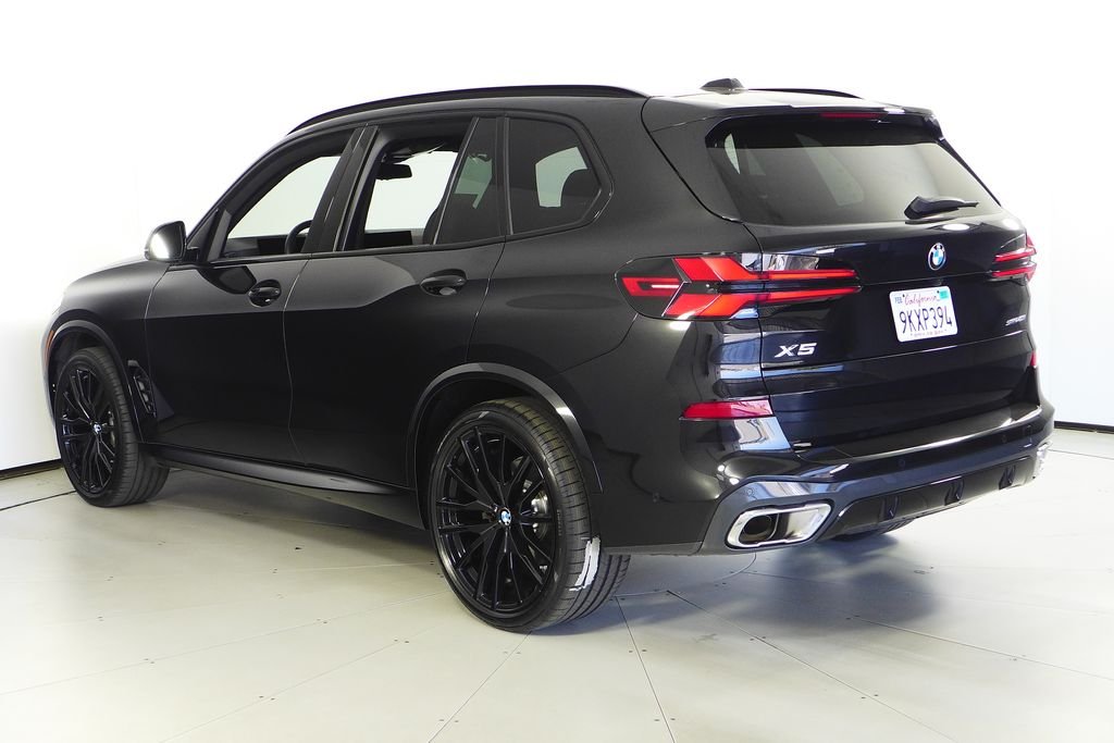 Certified Used 2024 Black Sapphire Metallic BMW sDrive40i image 9