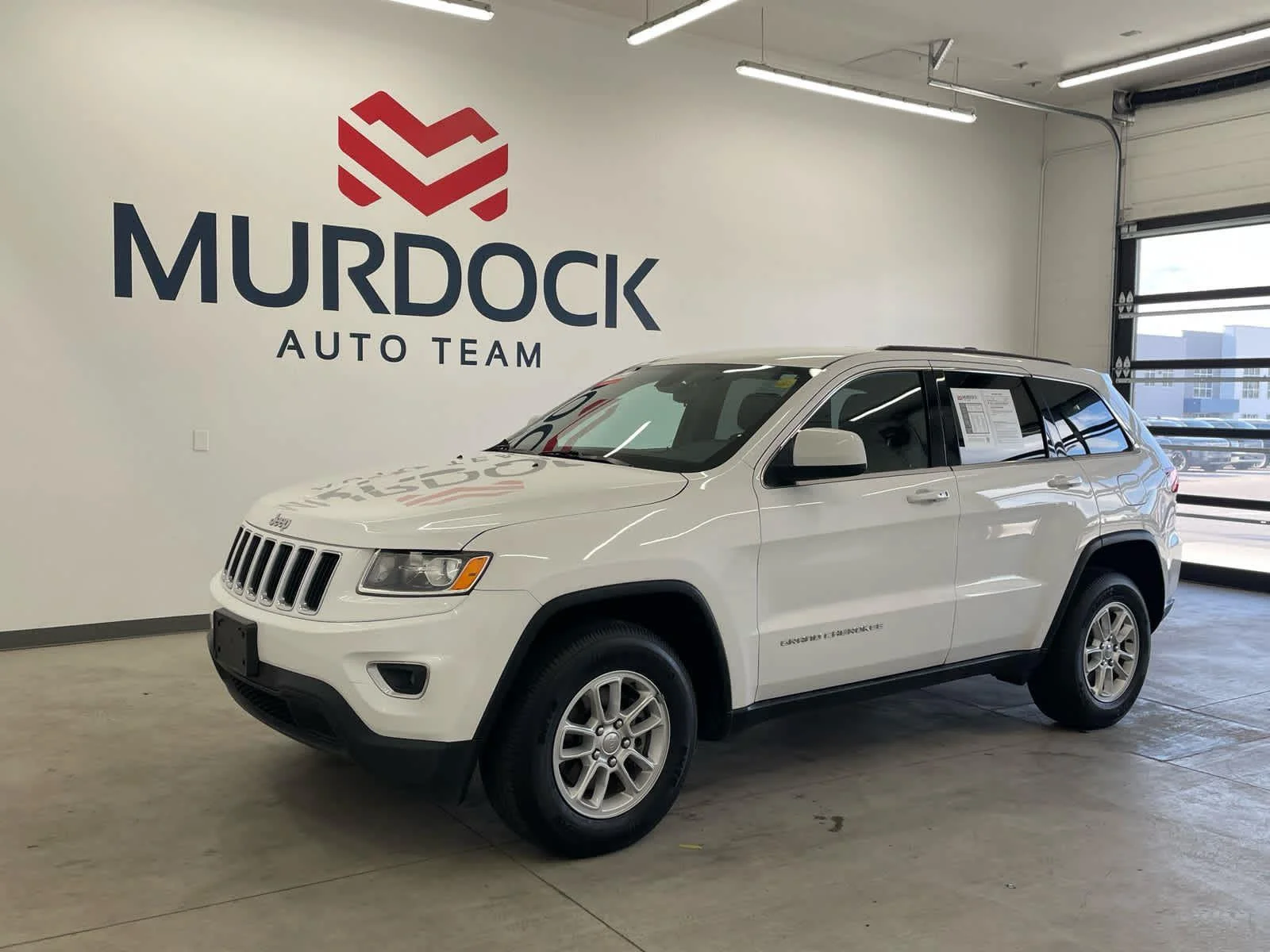Used 2015 Jeep Grand Cherokee Laredo with VIN 1C4RJFAG2FC234179 for sale in Logan, UT