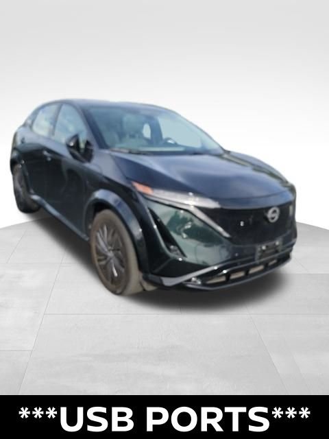 Certified Used 2024 Green Nissan EVOLVE+ e-4ORCE image 3