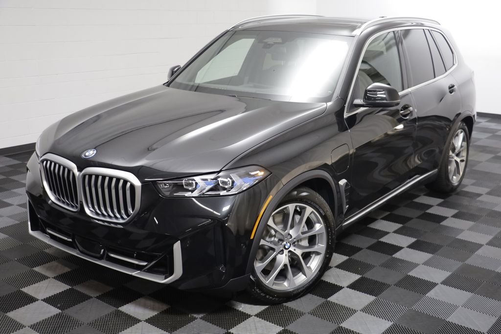 New 2026 Black Sapphire Metallic BMW xDrive50e image 2