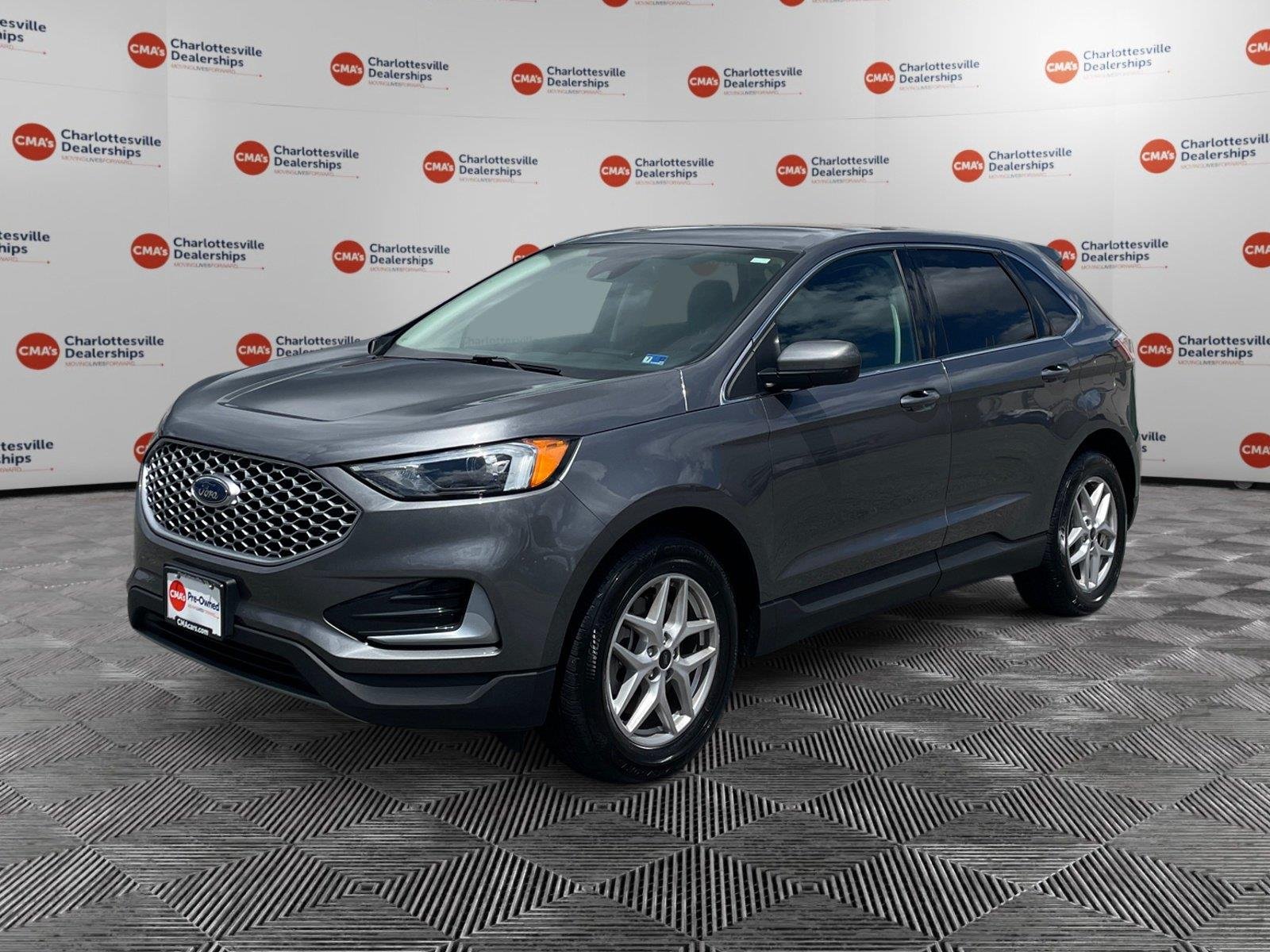 Used 2024 Carbonized Gray Ford SEL image 1