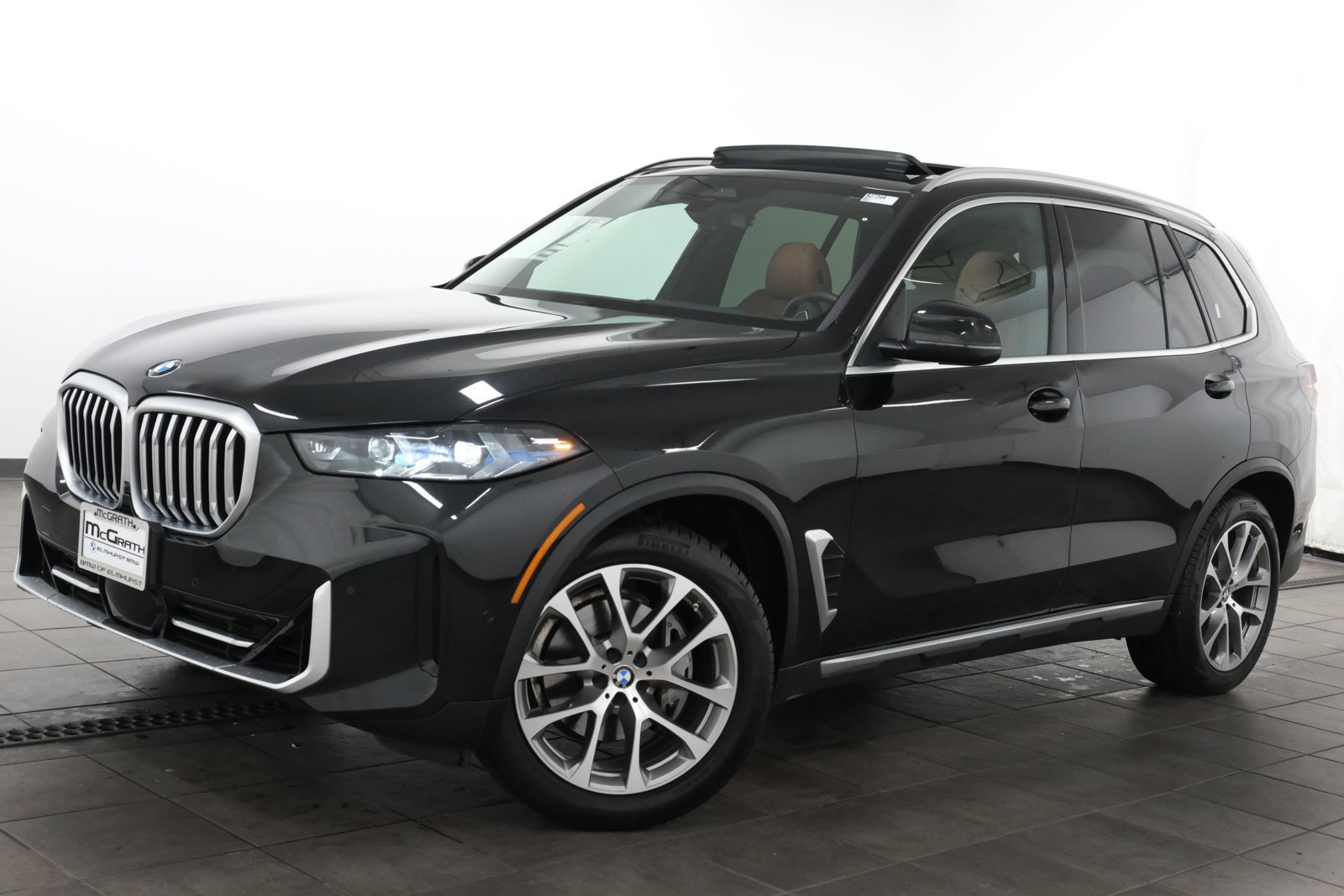 Certified Used 2024 Black Sapphire Metallic BMW xDrive40i image 1