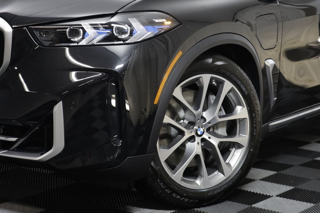 New 2026 Black Sapphire Metallic BMW xDrive50e image 4