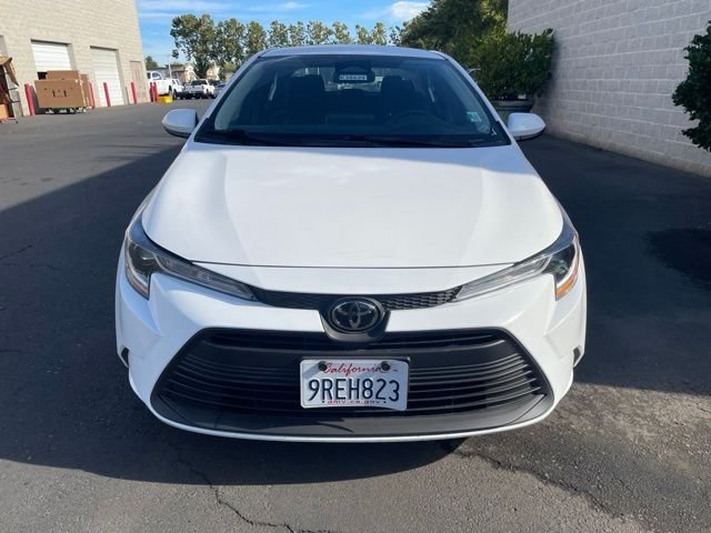 Used 2025 White Toyota LE image 2