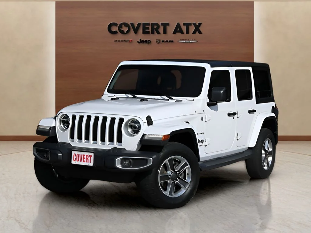 Used 2018 White Jeep Unlimited Sahara image 1
