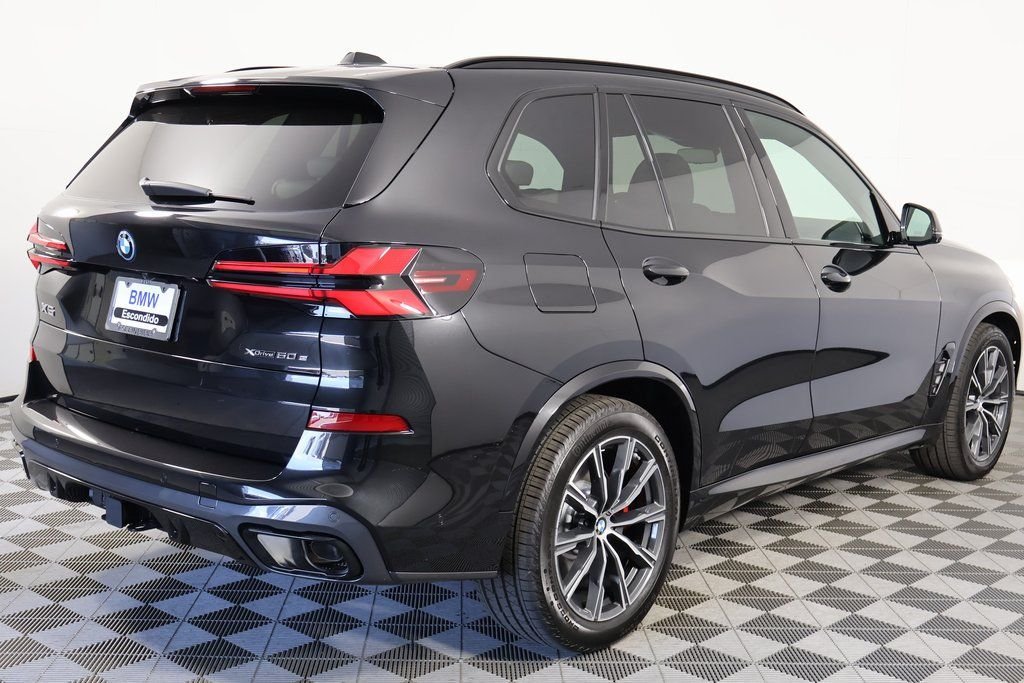 New 2026 Black Sapphire Metallic BMW xDrive50e image 2