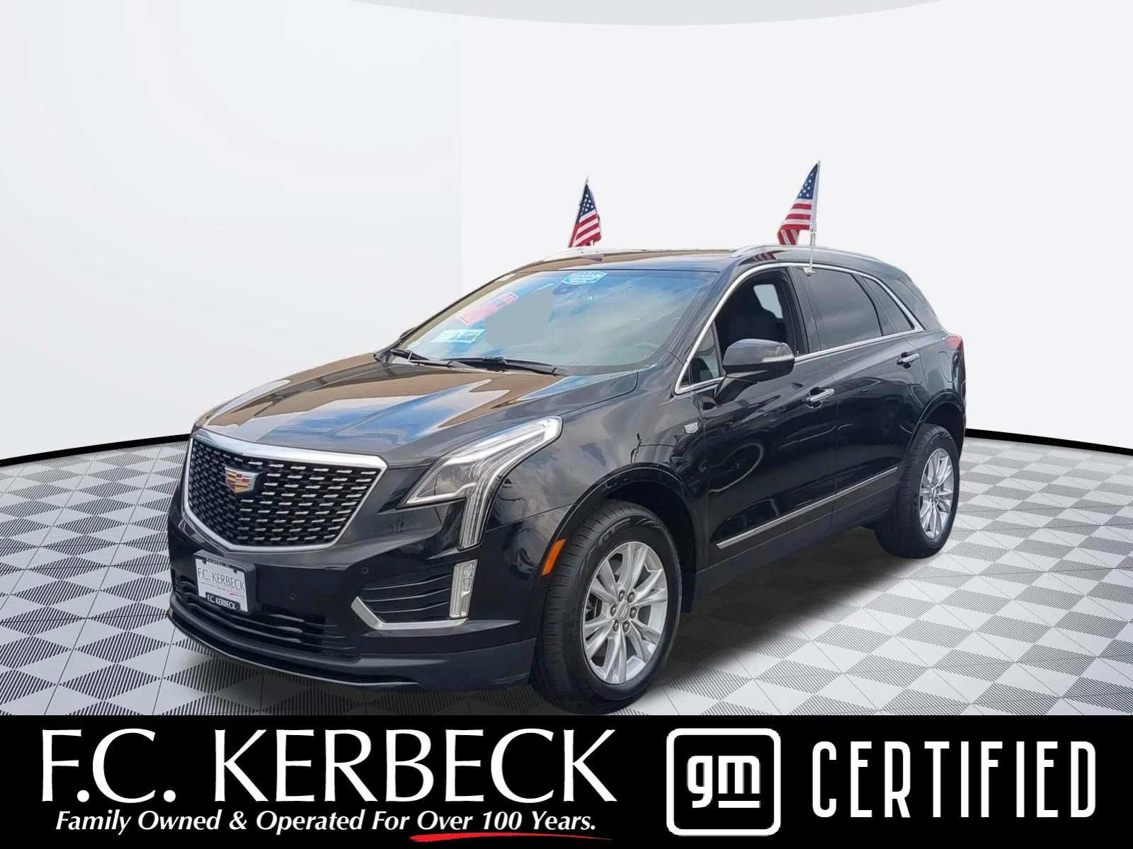 Used 2021 Stellar Black Metallic Cadillac AWD Luxury image 1