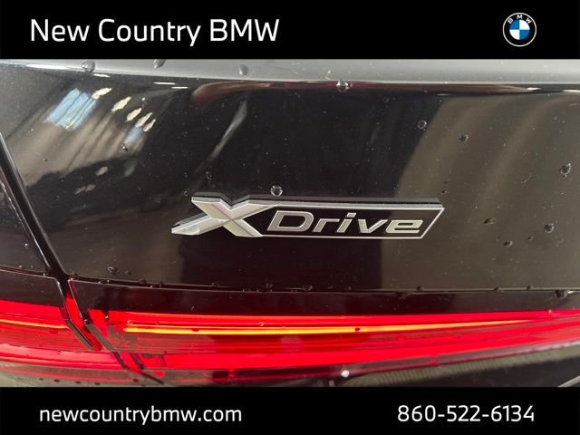 New 2027 Black Sapphire Metallic BMW 550e xDrive image 10