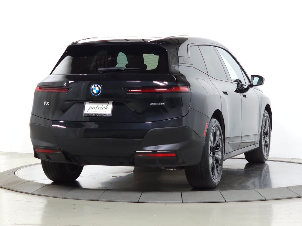 Used 2024 Black Sapphire Metallic BMW xDrive50 image 11