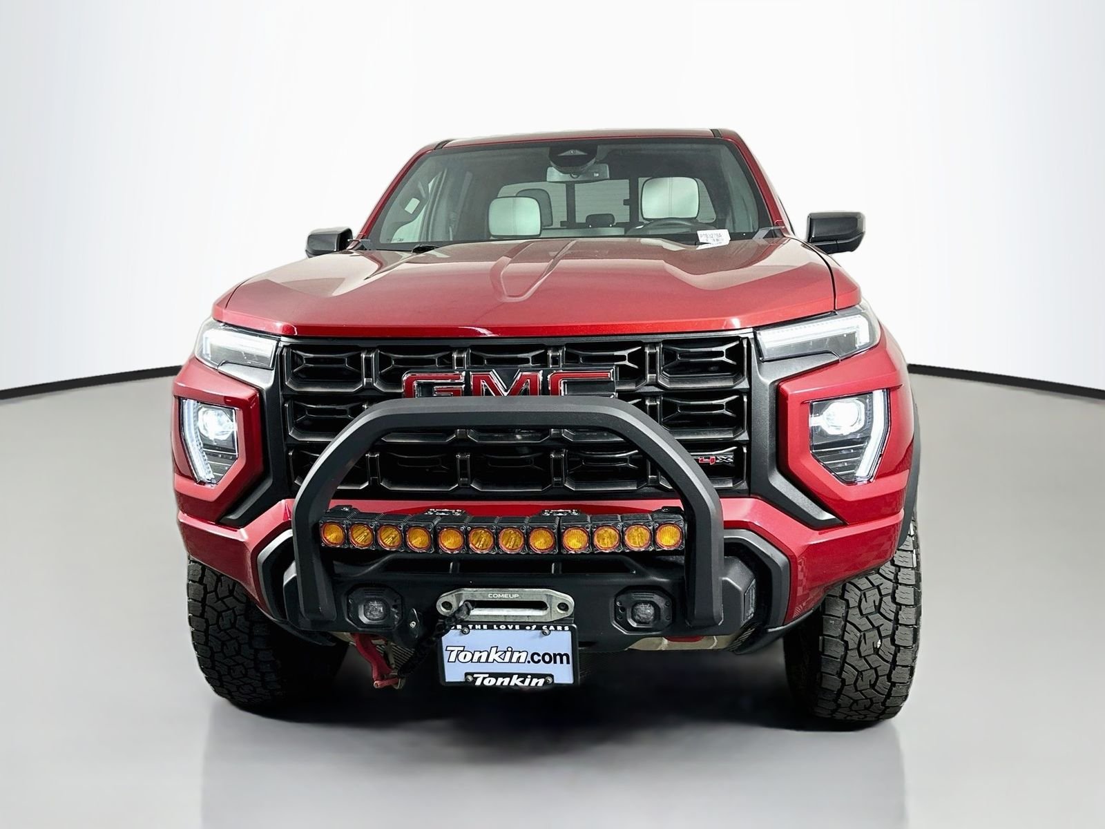 Used 2023 Volcanic Red Tintcoat GMC AT4X image 2