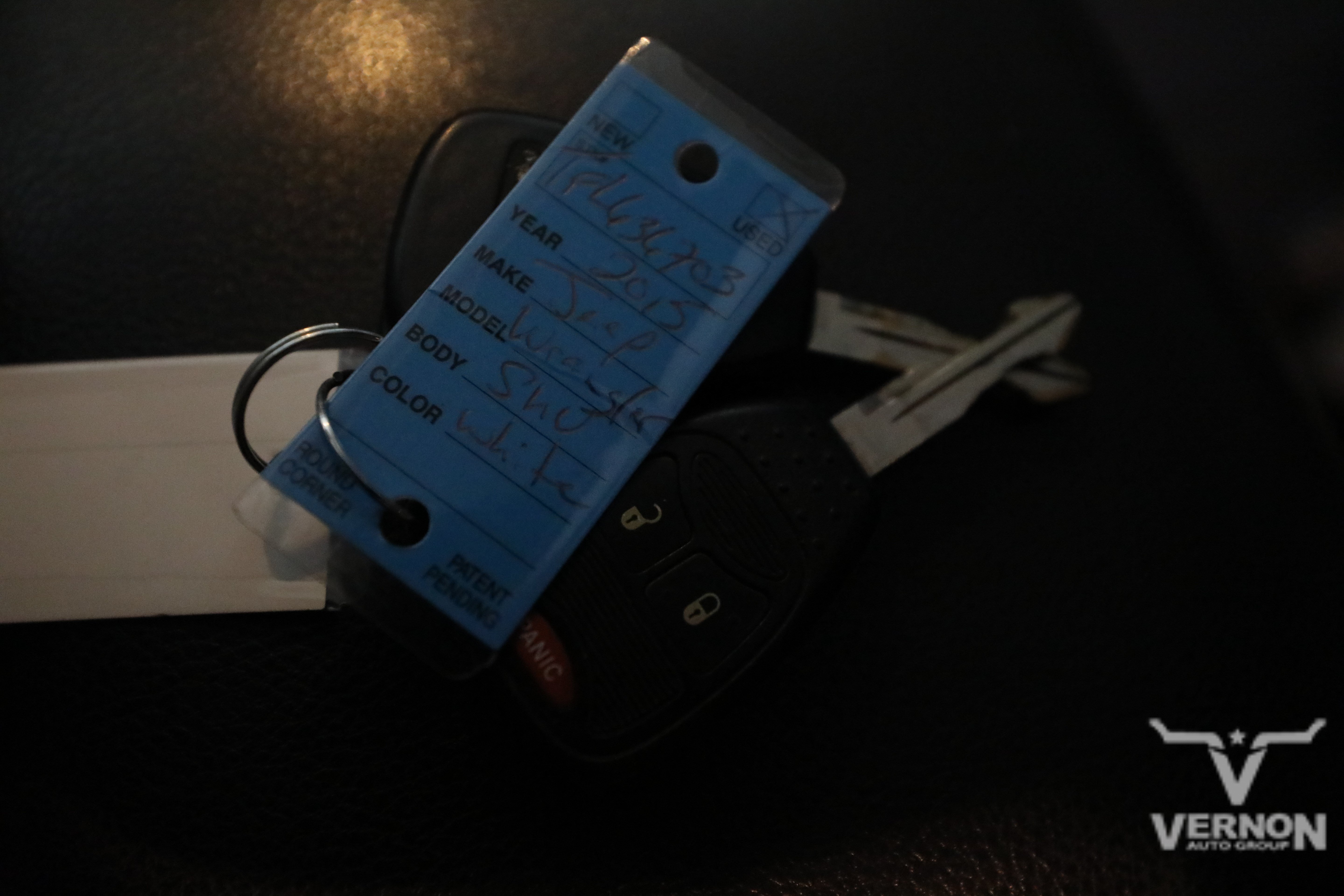 Used 2015 Bright White Clearcoat Jeep Y image 12