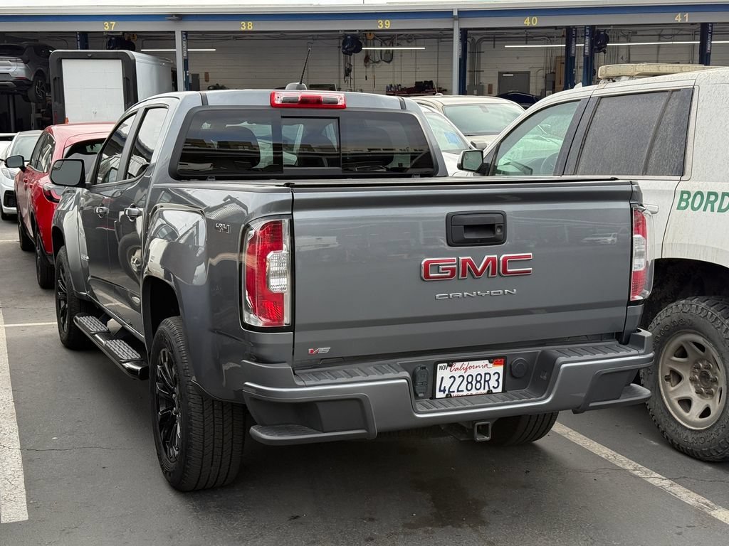 Used 2022 SATIN STEEL METALLIC GMC 4WD Elevation image 14