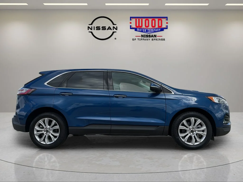 Used 2023 Blue Metallic Ford Titanium image 2
