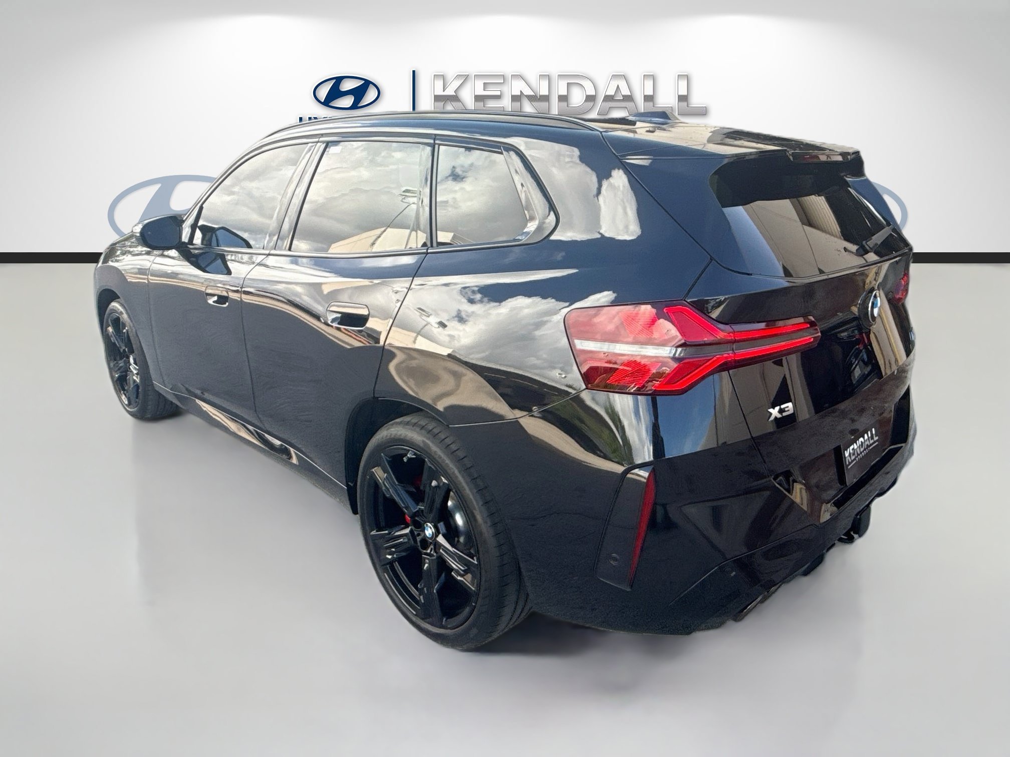 Used 2026 Black Sapphire Metallic BMW M50 xDrive image 4