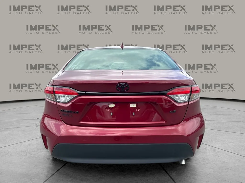 Used 2026 Red Toyota LE image 4